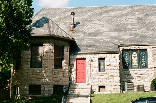 Photo of a building with a red door in Columbia, MO.