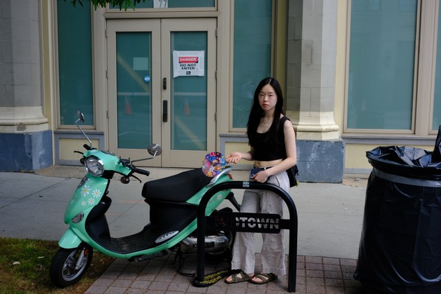 Photo of chloe by a Vespa clone in Atlanta, GA.